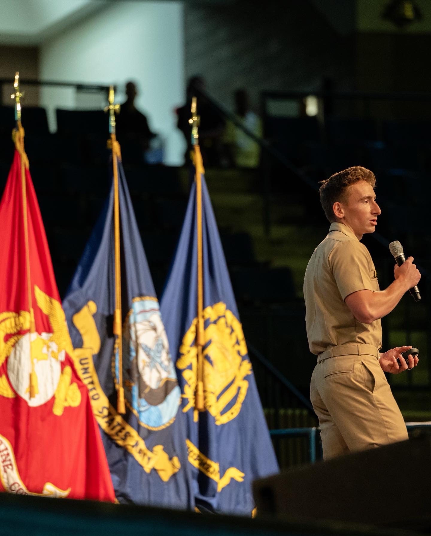 Speaking — flags behind